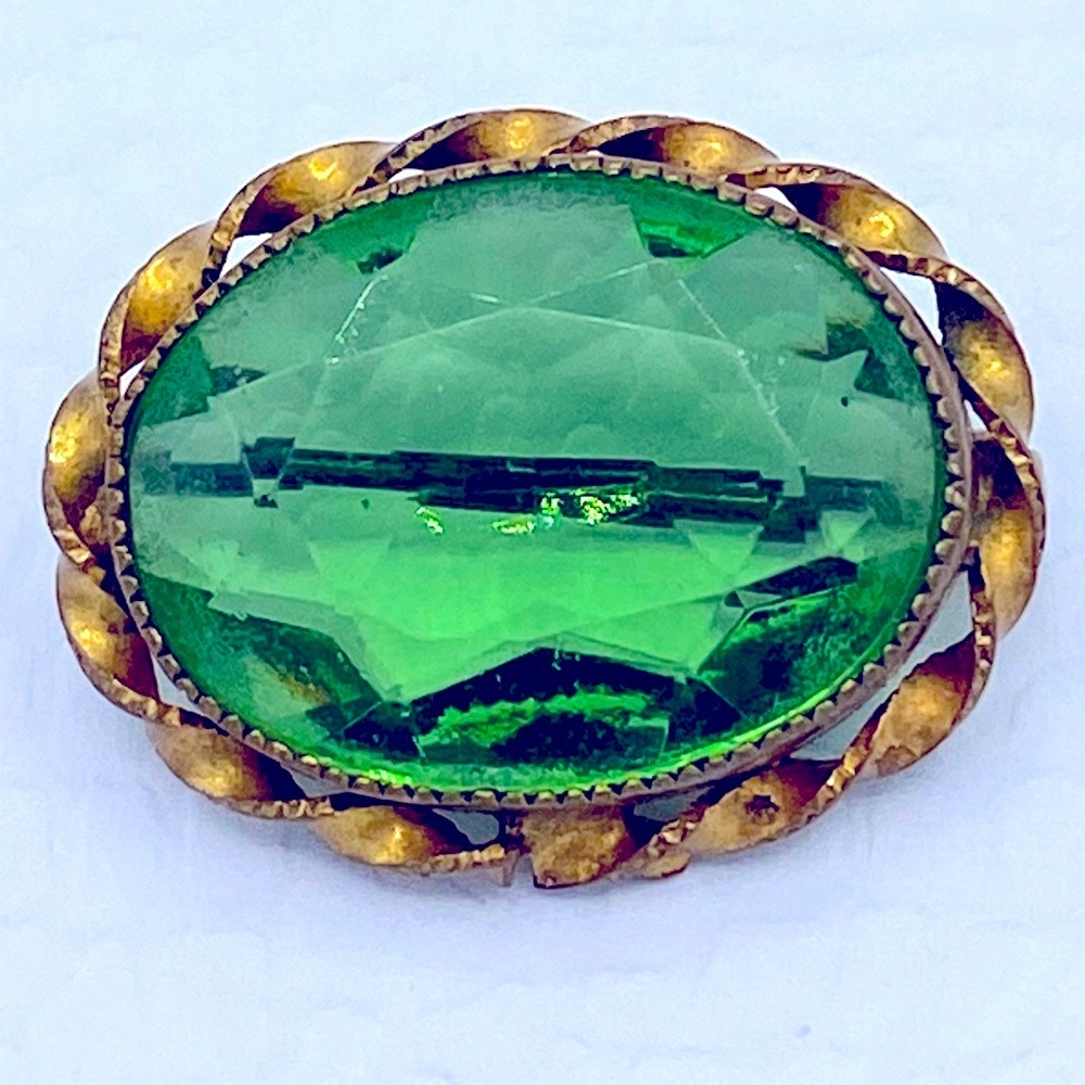 Antique Faceted Green Stone Brooch Enhanced With Gold Toned Twisted Rope Design